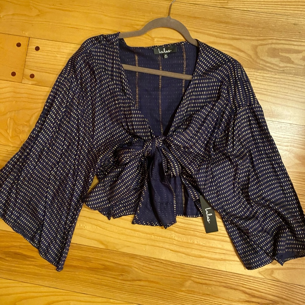 Brand new- top in navy and gold accents with tie in front